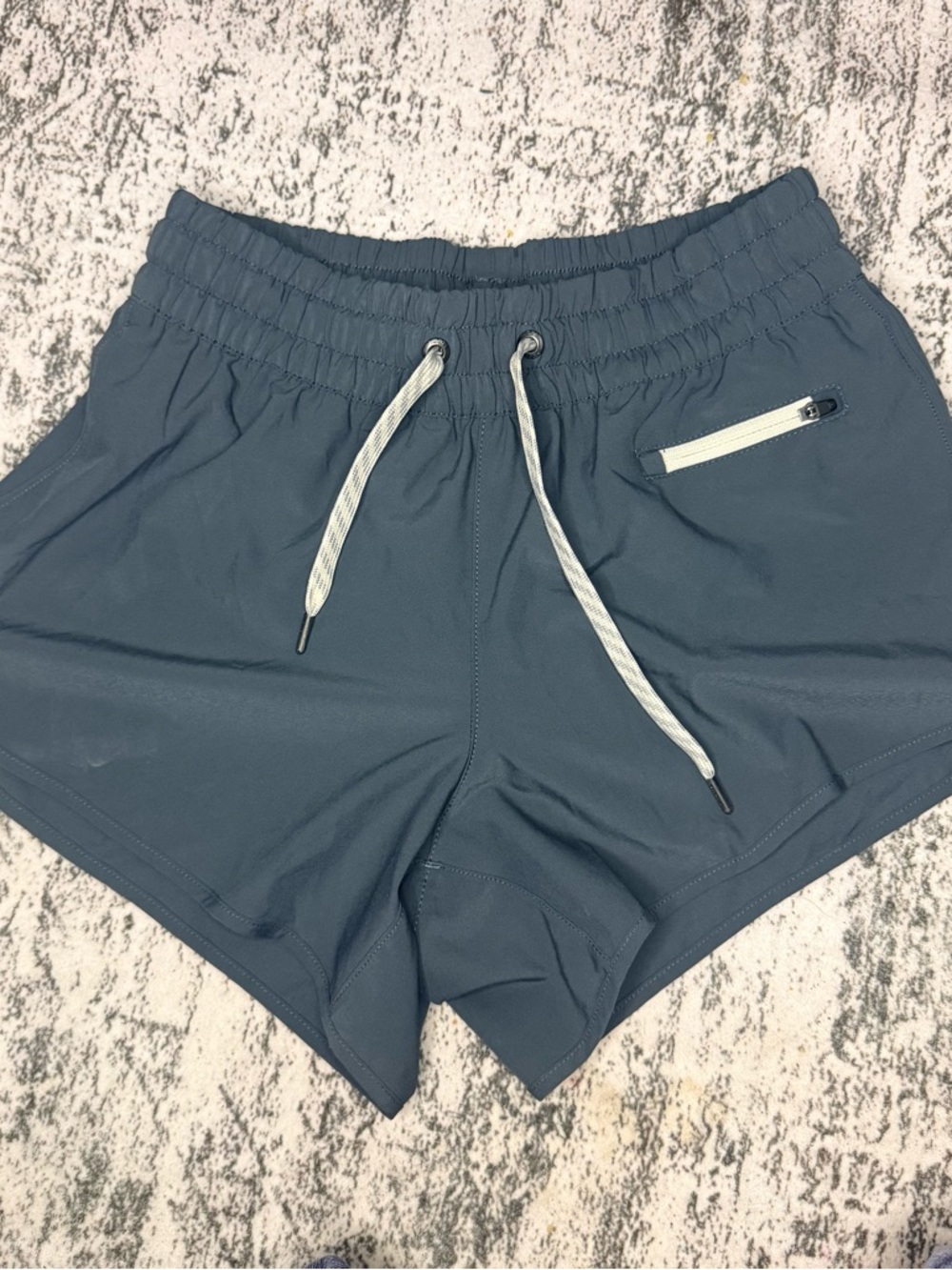 Vuori Women's Athletic Shorts in Slate Blue
